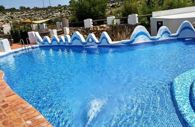 Holiday Home 'El Cup' with Mountain View, Shared Pool and Private Terrace