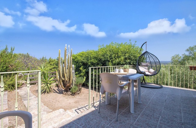 Holiday Home "Vista Mozzafiato ad Isola Rossa" with Sea View, Private Terrace & A/C