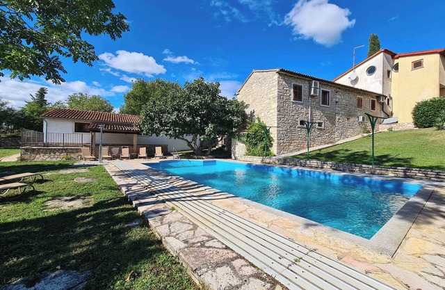 Holiday home with an outdoor pool and WiFi
