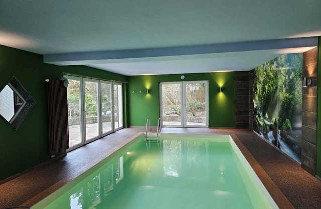Holiday home with garden and private pool
