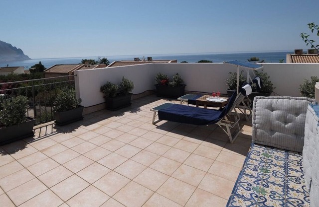Holiday home with garden, sea view