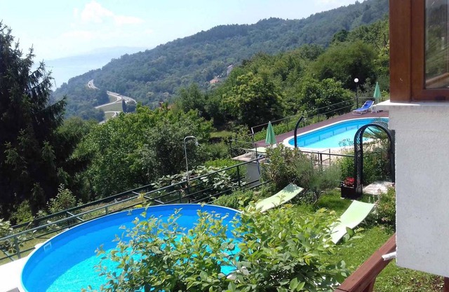 Holiday home with pool and air conditioning