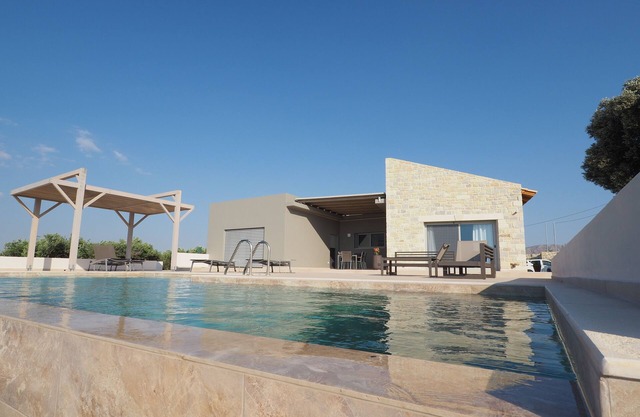 Holiday house Spiti Karma - relax by the pool with a view of the sea, plain and mountains.