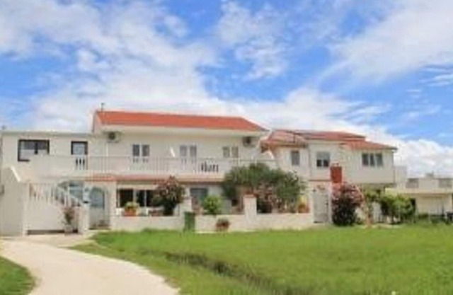 Holiday with the family at the sandy beach, apartments with sea view