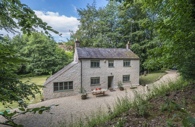 Horsehill Cottage -located in its own magical woodland setting near Stoke Abbot.
