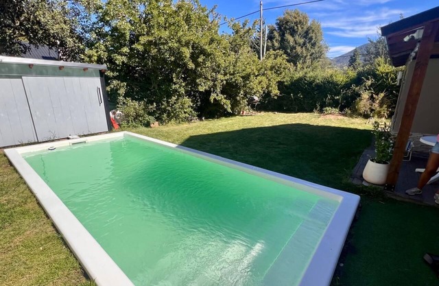 House with heated pool/pool table and ping pong table