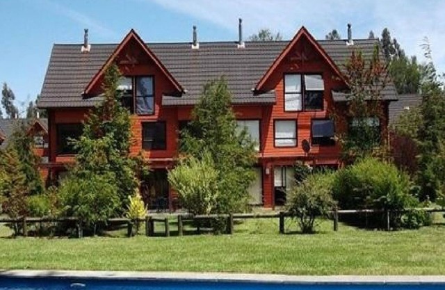 House Hacienda Puerto Pucon in Private Condominium 3 Swimming Pools parking lot