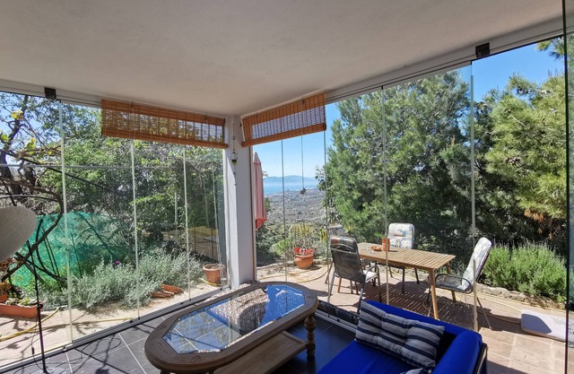 House overlooking the sea and Malaga