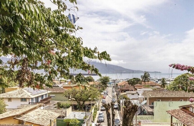 House with a beautiful view and a deck overlooking the sea