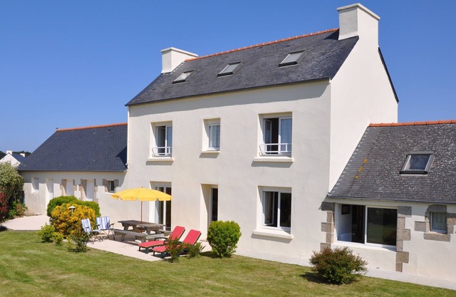 House with garden, close to the sea.