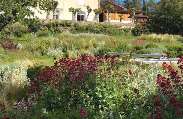 House with pool in enclosed garden in the heart of a village