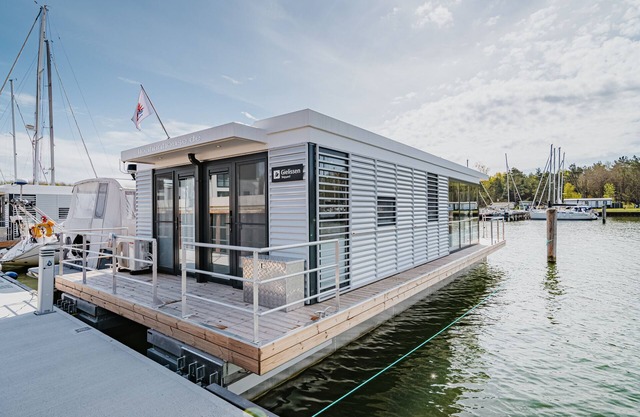 Houseboat Trinity, a sealoft on the Baltic Sea in Peenemünde Island Usedom