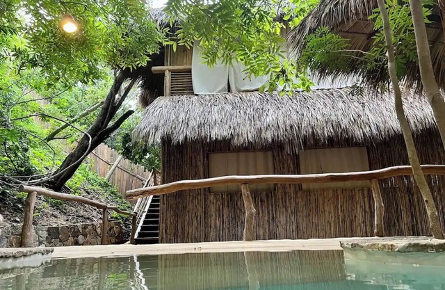 Huge full private villa in front of virgin bay
