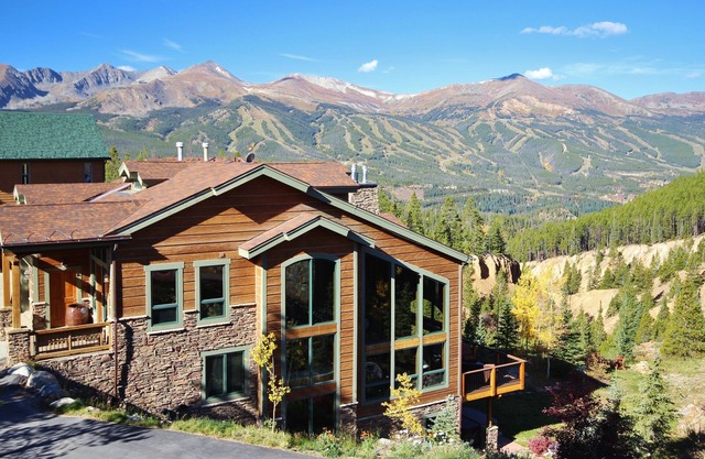 Huge Views with 3 master suites, movie room and close to shuttle