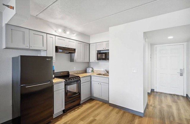 Ideal Mix of Comfort and Value! 2 Convenient Units, Beachfront Property w/Pool