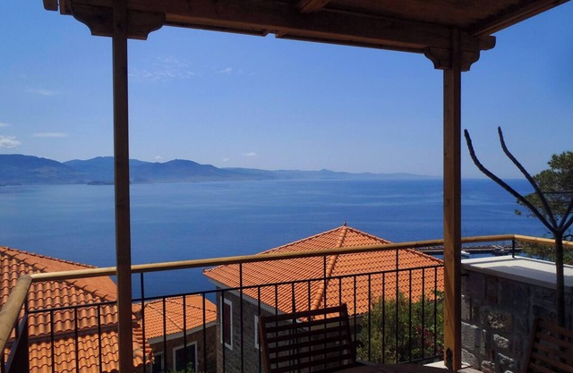 Ideally located in the village center, near the sea with breathtaking views