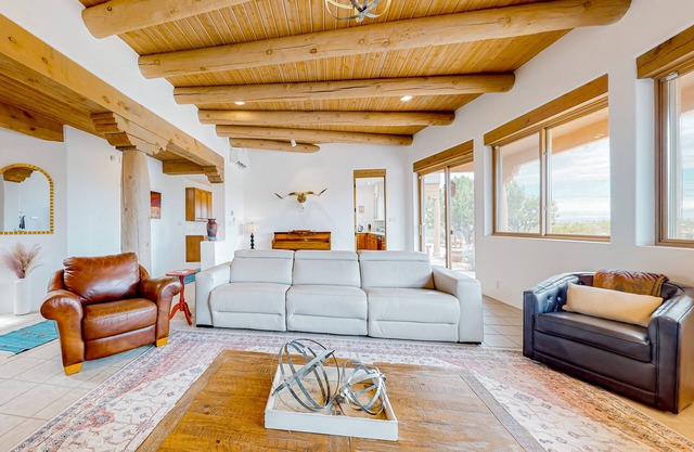 Idyllic mountain-view retreat with luxe interior & private sunset-view hot tub