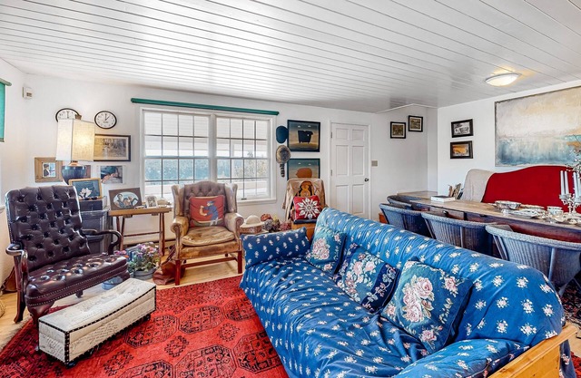 Idyllic rural home with private pond, river access, pool, patio, & covered decks