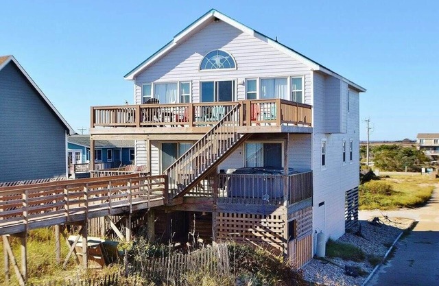 Imagine sitting on the deck in the morning watching the dolphins play in the ocean!