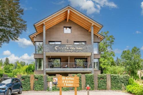 INVITA Natur-Chalets - Gruppenurlaub, Events im Schwarzwald - 6 Apartments, 25 Personen