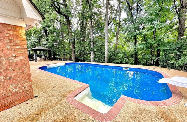 Inviting 4-BR Home with Pool Near Shelby Park Memphis, Private Backyard Oasis.
