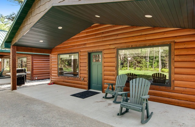Inviting dog-friendly cabin with hot tub, fireplace, patio, grill, central AC, & W/D