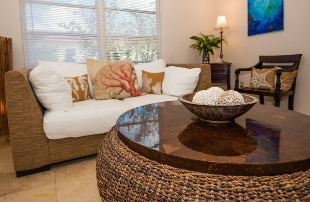 Island House: Modern suites w/ pool, tropical gardens & incredible water views