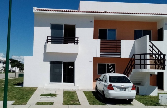 It is a nice , comfortable in private and secure subdivision, near beaches .