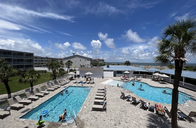 Just Remodeled! A few steps to the beach in Beautiful 3 Bedrm Oceanfront Condo!