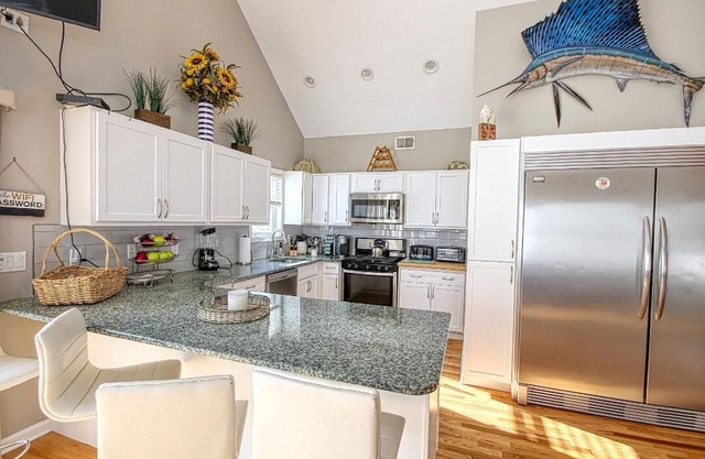 Just steps to the Boardwalk and Ocean this is a spacious 5 bed 3 full bath home!