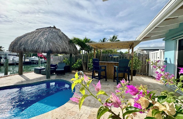 Keys Family Getaway – 2BR/2BA Home with Private Pool & Dock in Key Colony Beach.