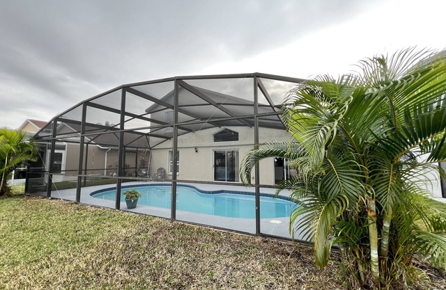 King Bed and waterfront pool