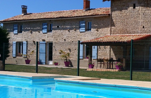 La Ballerie farmhouse & gîte. Heated pool and games barn in walled garden.