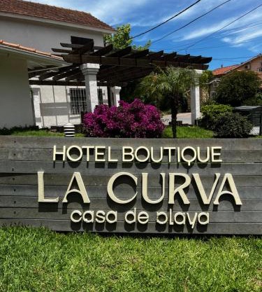 LA CURVA Casa de Playa