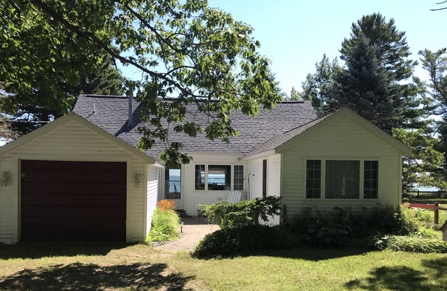 Lake Huron waterfront home which is the perfect place for your family to vacation. Located in Greenbush which is between Oscoda and Harrisville. Enjoy walks on the beach. View freighters, sailboats on the beautiful lake. The Ausable River is about 10 m...
