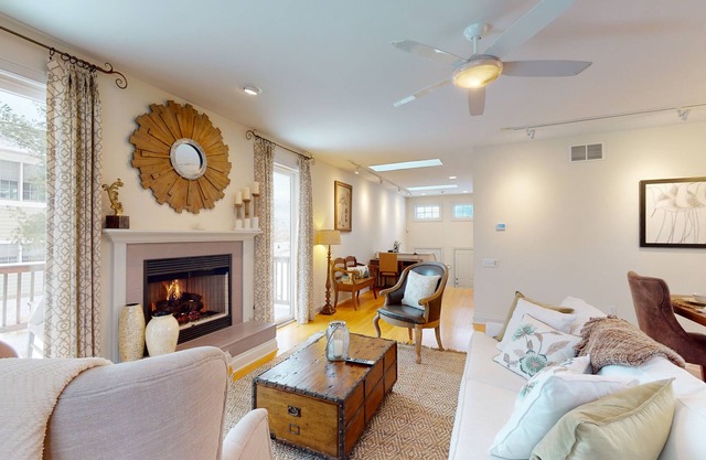 Lake-view home one block from the beach with deck, patio, & washer/dryer