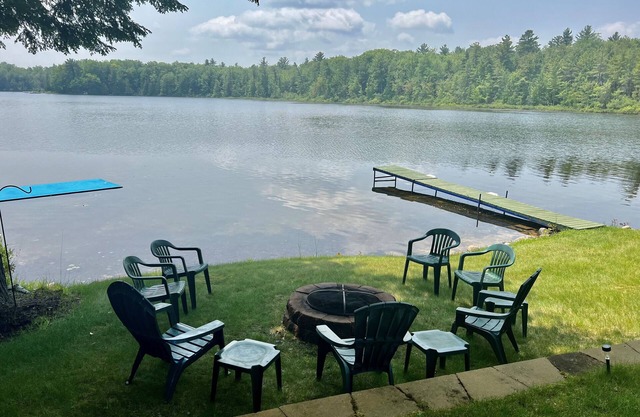 Lakefront cabin on Bass Lake near Traverse City. Pets ok. Fire pit. Grill.