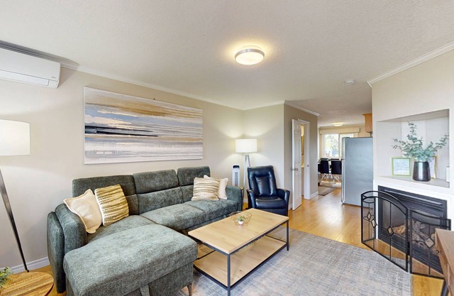 Lakefront condo steps to the beach with pool, and fireplace