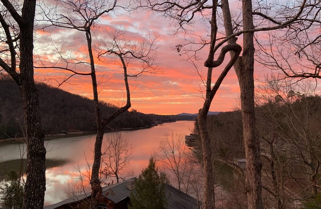 Lakefront condo with wood-burning fireplace, WiFi, two decks, & great views