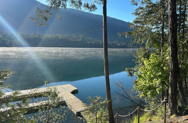 Lakefront home on Bull Lake! Water ski off private deep-water dock w/boat slip.