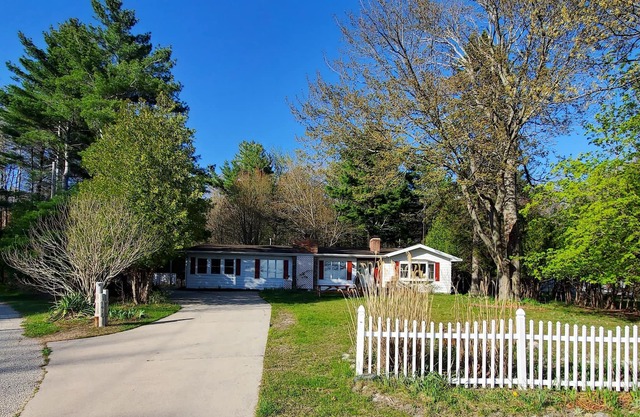 Lakefront home on Silver Lake centrally located between the dunes and town.