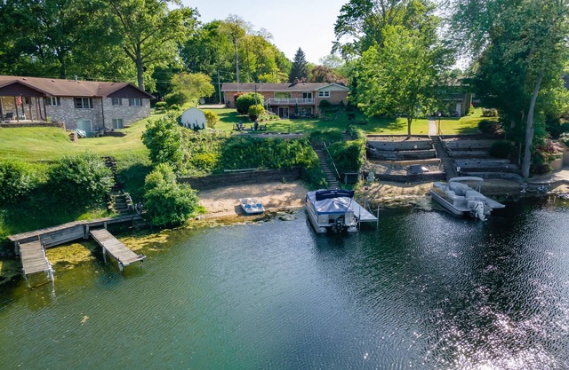 Lakefront home w Private Beach, Hot Tub, Sauna