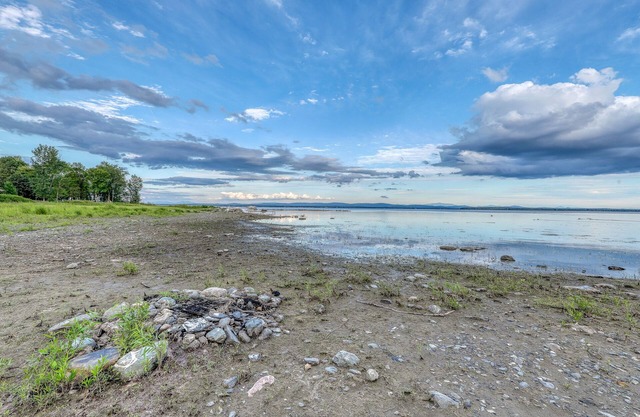 Lakefront home with 17 acres - amazing water views, sauna, inviting deck