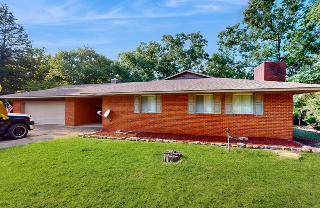 Lakefront home with water view, central AC, & washer/dryer