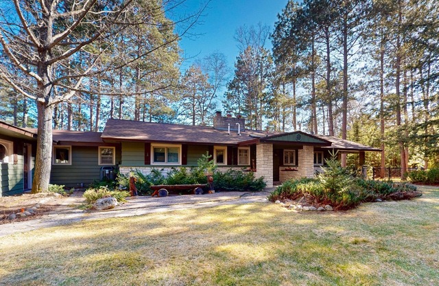 Lakefront house with private covered hot tub, dock, wood fireplace, & firepit