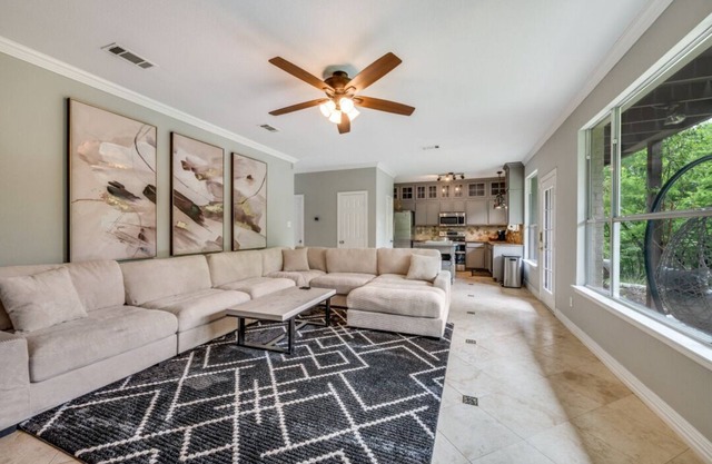 Lakefront retreat just steps from Lake Lewisville! Enjoy 341 ft of shoreline, a private cove, sandy beach, fire pit, and pergola with built-in grill. Inside: lake views, travertine floors, cozy fireplace, and an upstairs game room with balcony.