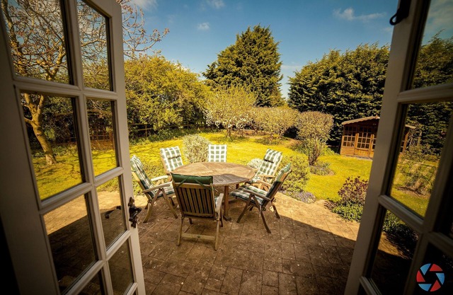Large Detached Bungalow and Garden Within Village with pubs and shop