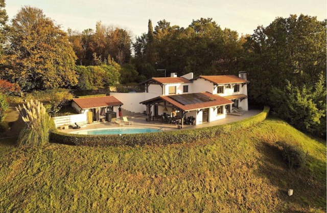 Large, friendly and comfortable house with exceptional views and large pool