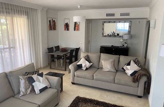 Large High Quality Apartment in Elviria . Large Terrace, Pools and Gardens