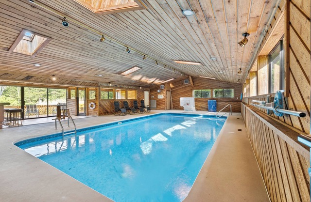 Large house with heated indoor pool and big yard with firepit